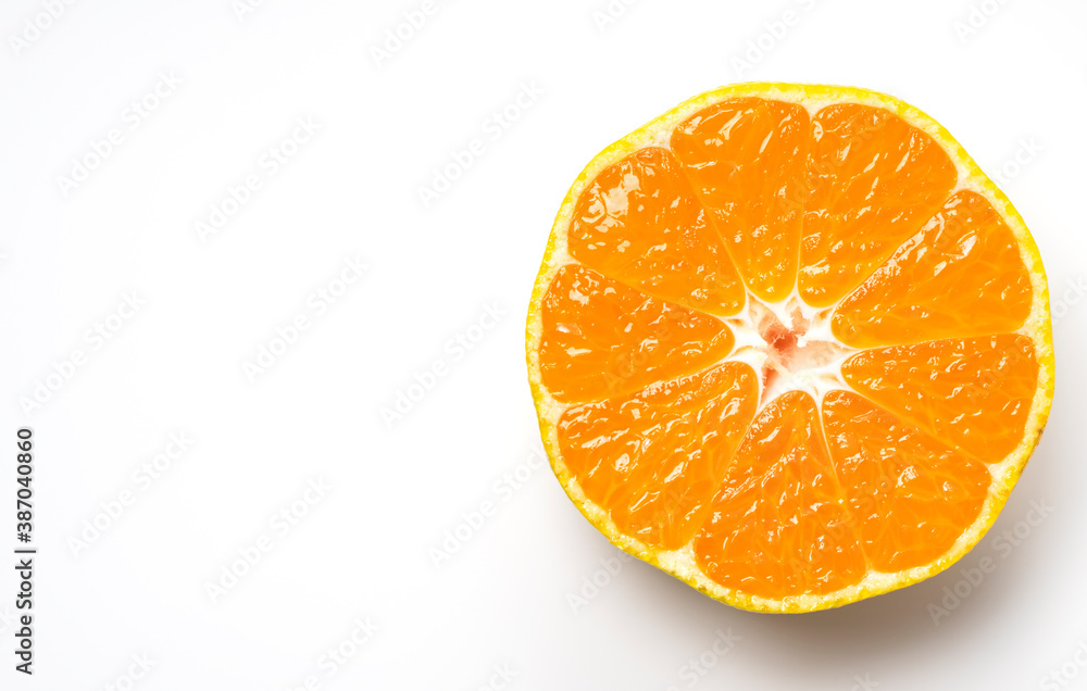 Early Japanese mandarin oranges on a white background