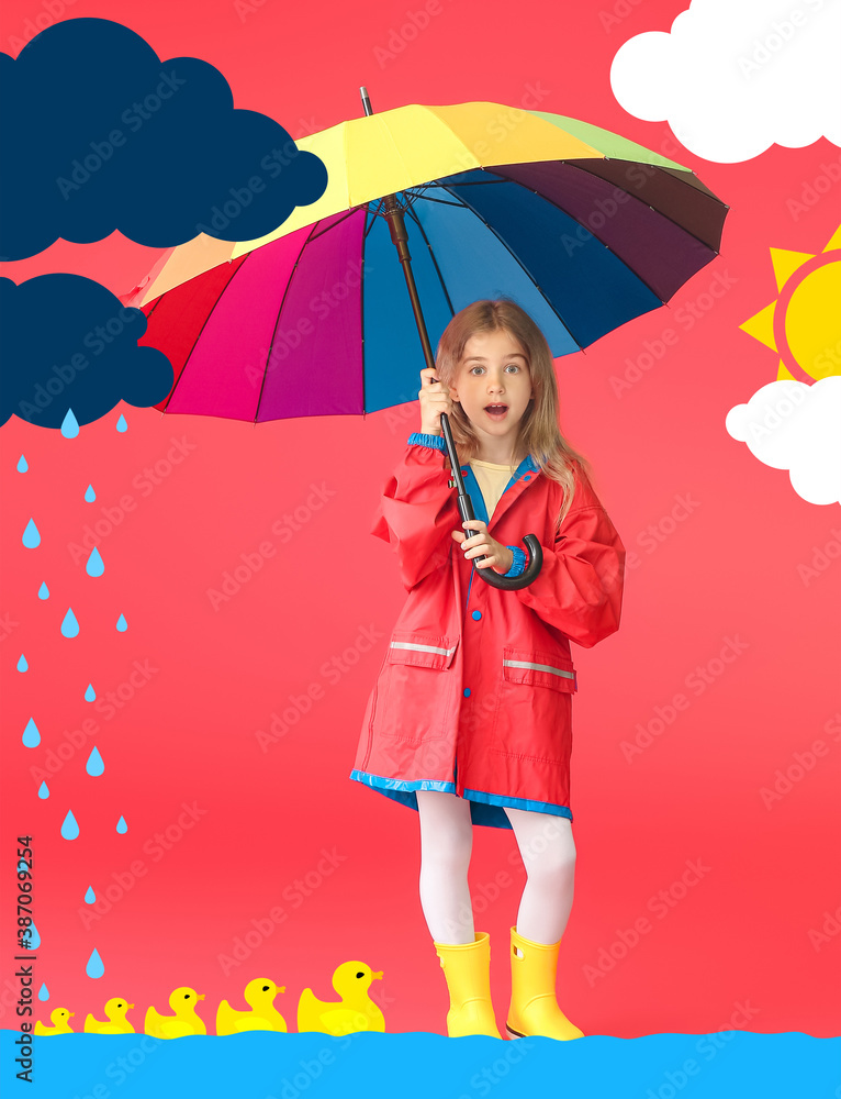 Surprised little girl in raincoat and with umbrella on color background