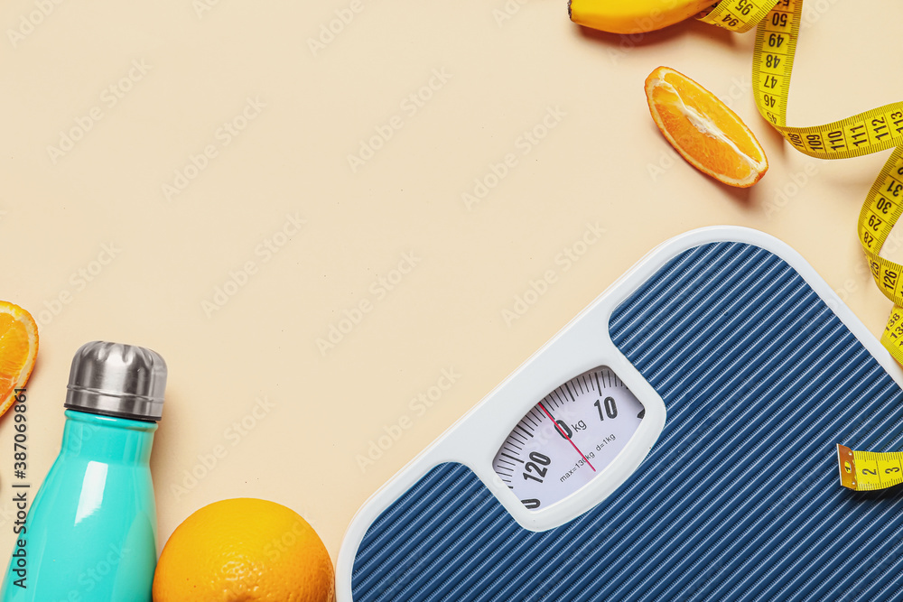 Fresh products, scales and measuring tape on color background. Diet concept