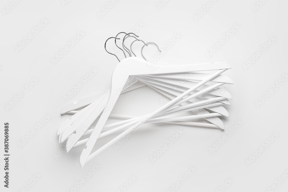 Clothes hangers on white background