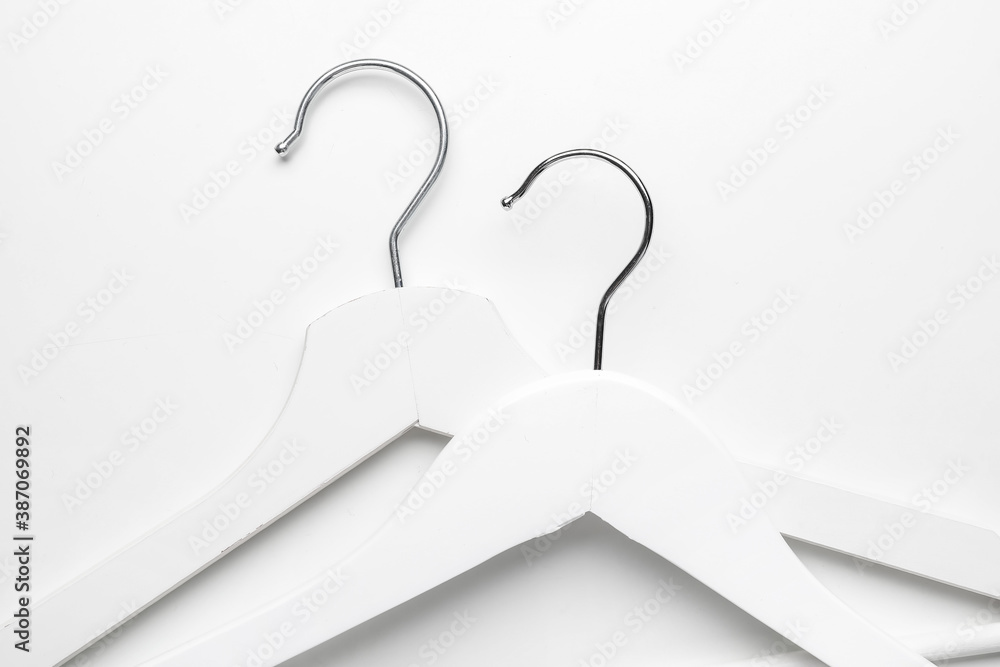 Clothes hangers on white background