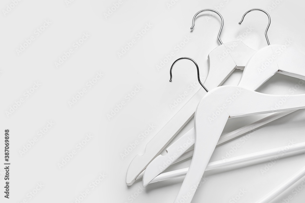 Clothes hangers on white background