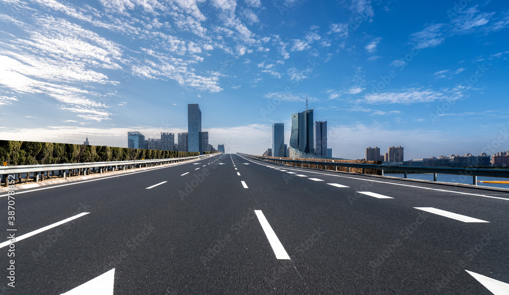 Road ground and modern architectural landscape skyline of Chinese city