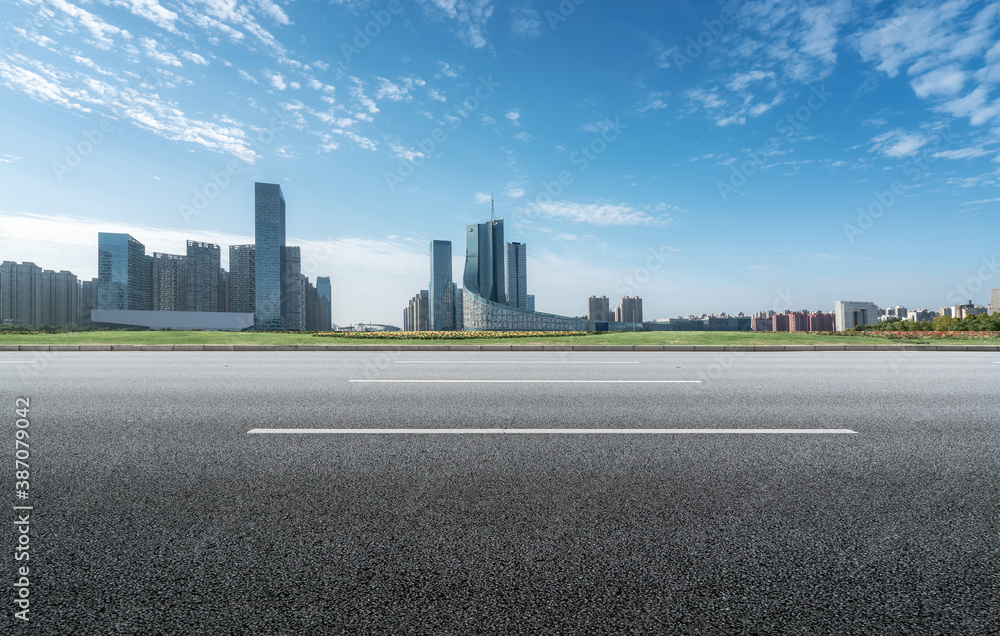 Road ground and modern architectural landscape skyline of Chinese city