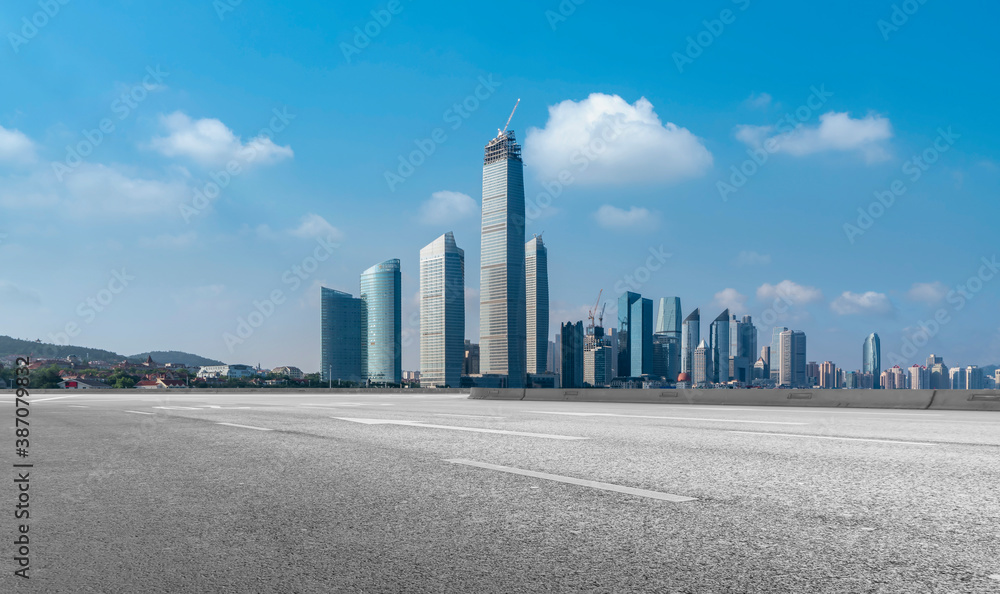 Road ground and modern architectural landscape skyline of Chinese city