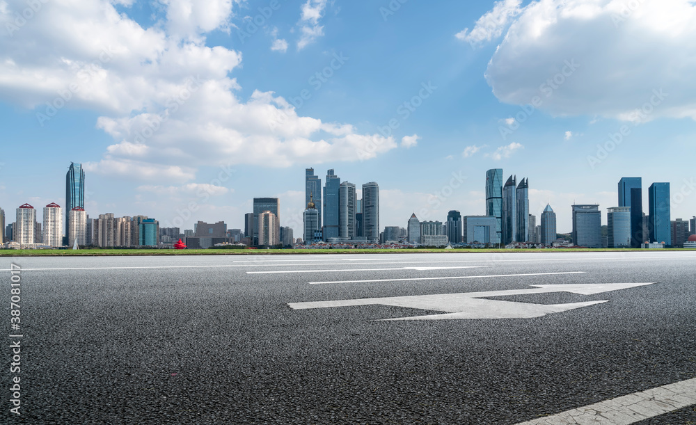 Road ground and modern architectural landscape skyline of Chinese city