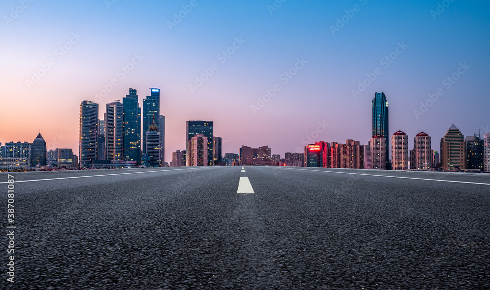 Road ground and modern architectural landscape skyline of Chinese city