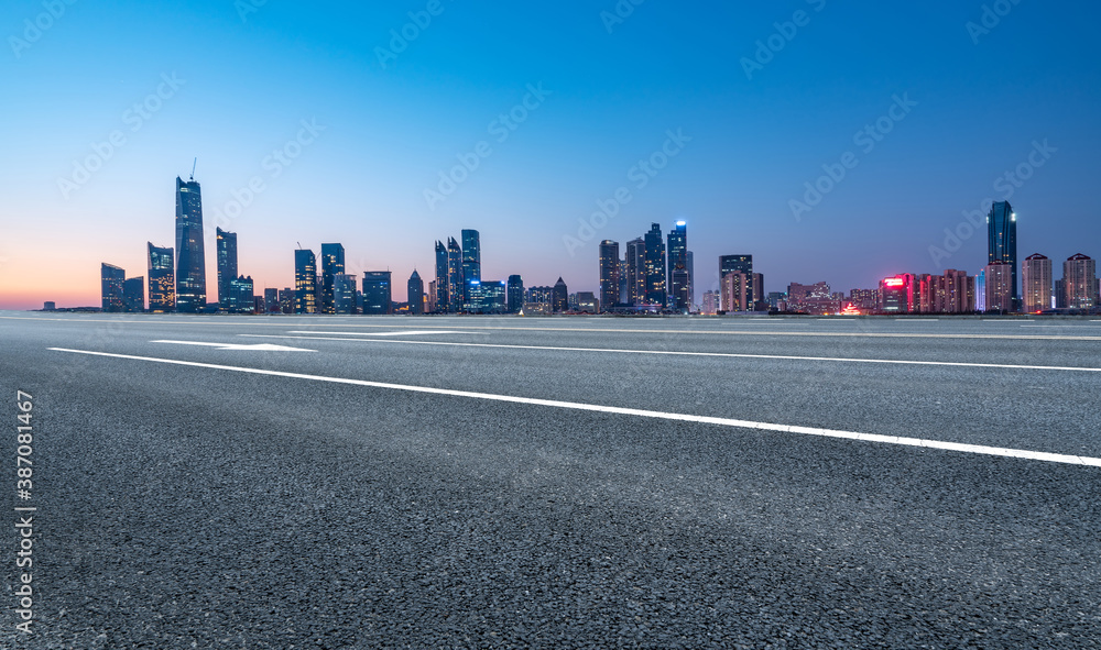 Road ground and modern architectural landscape skyline of Chinese city