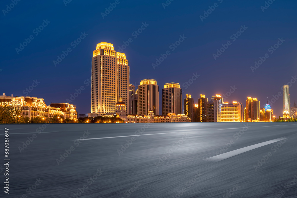 Road ground and modern architectural landscape skyline of Chinese city