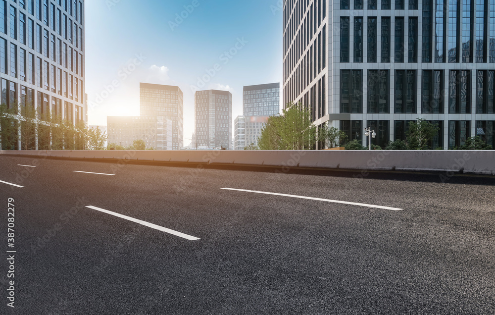 Road ground and modern architectural landscape skyline of Chinese city