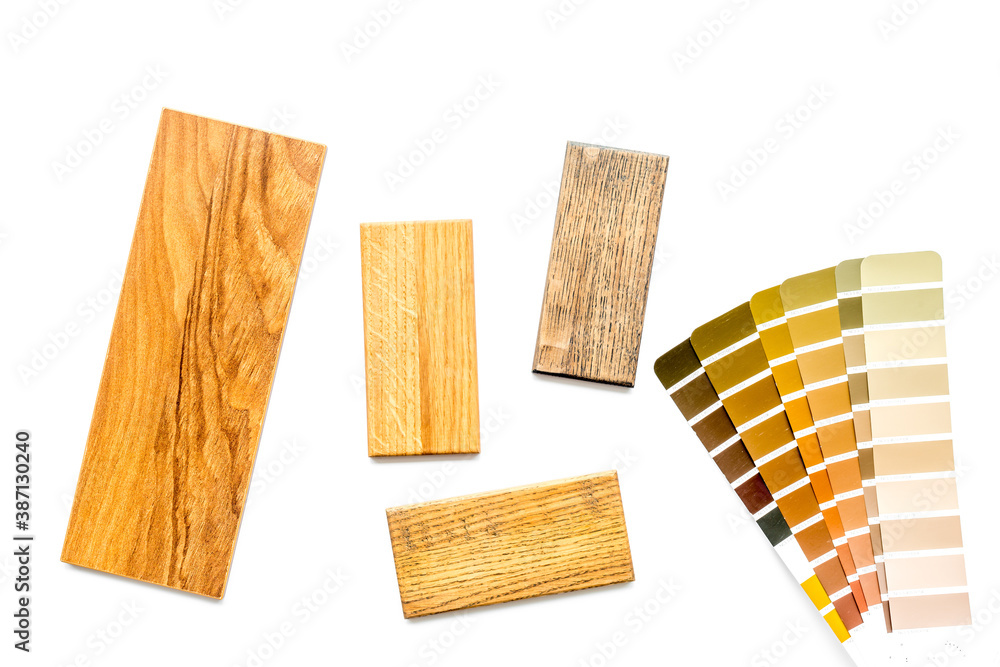 Wooden board floor and furniture samples with color scheme. Top view