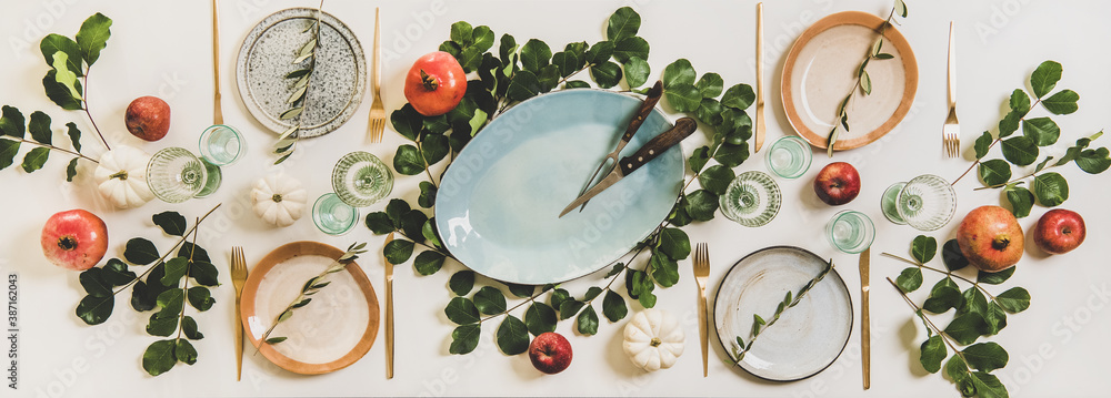 Autumn Thanksgiving, Friendsgiving, family gathering dinner table setting. Flat-lay of white Fall ta