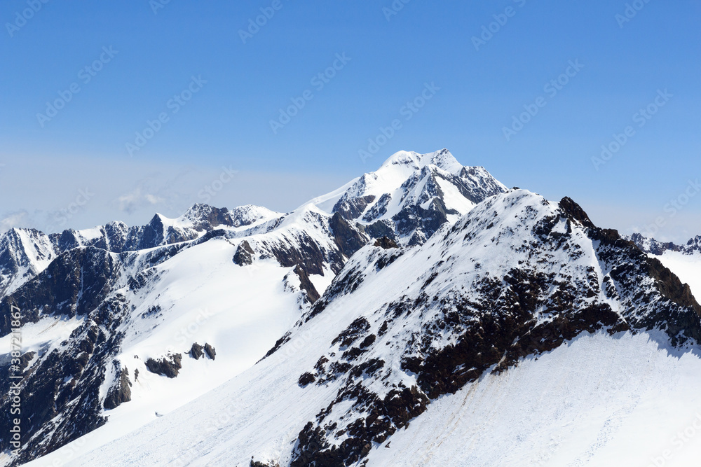 Mountain Wildspitze, snow panorama and blue sky in Tyrol Alps, Austria