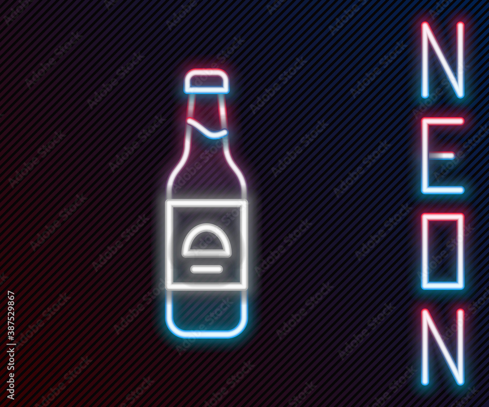 Glowing neon line Beer bottle icon isolated on black background. Colorful outline concept. Vector.