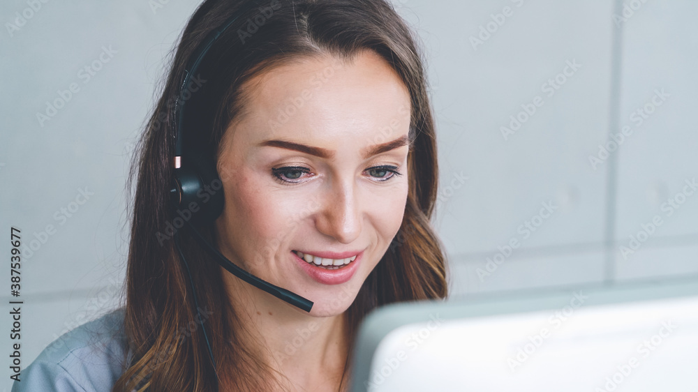 Business people wearing headset working in office to support remote customer or colleague. Call cent