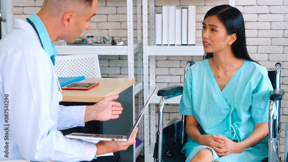 Doctor in professional uniform examining patient at hospital or medical clinic. Health care , medica