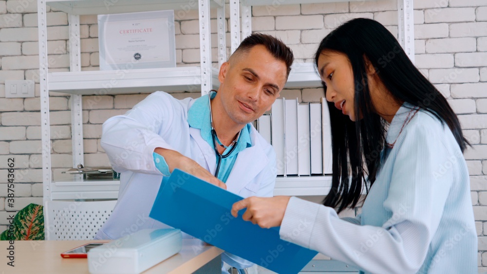 Doctor in professional uniform examining patient at hospital or medical clinic. Health care , medica