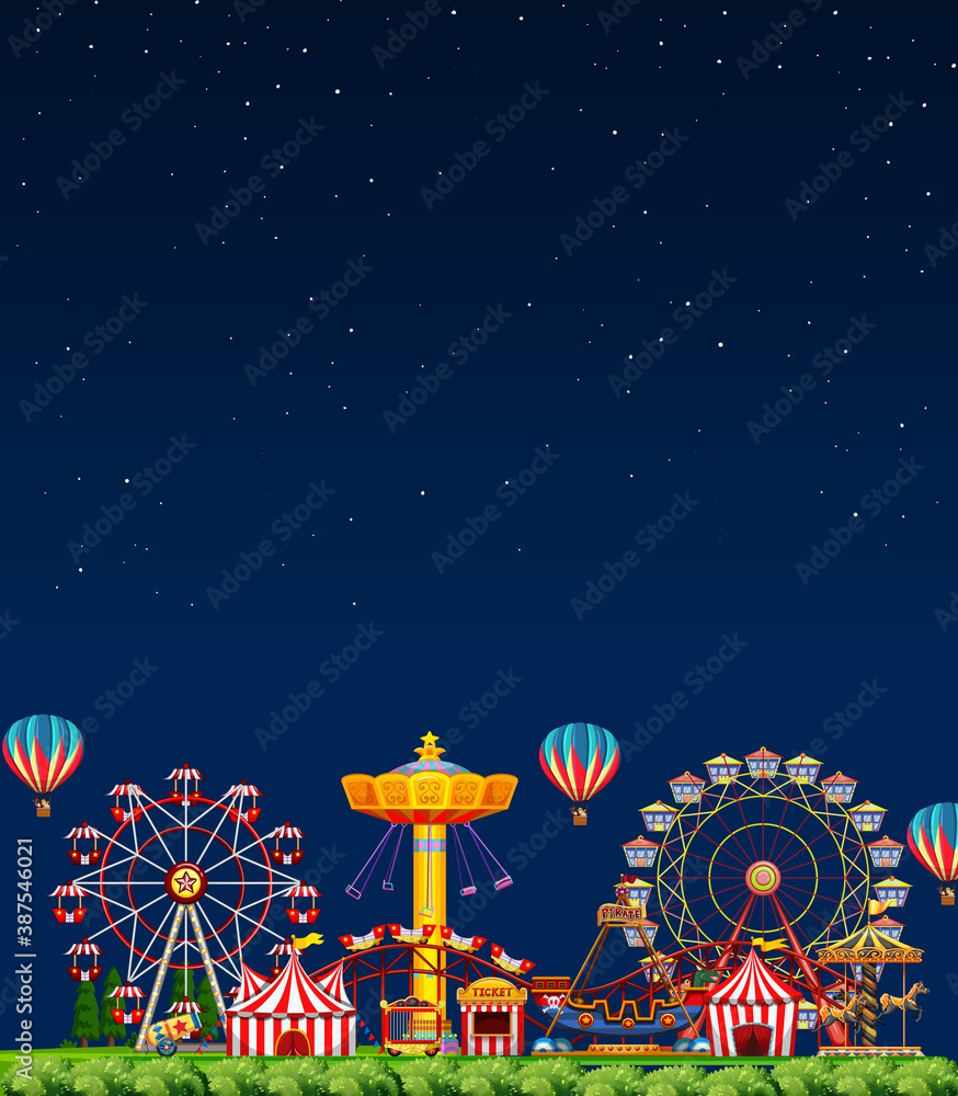 Amusement park scene at night with blank dark blue sky