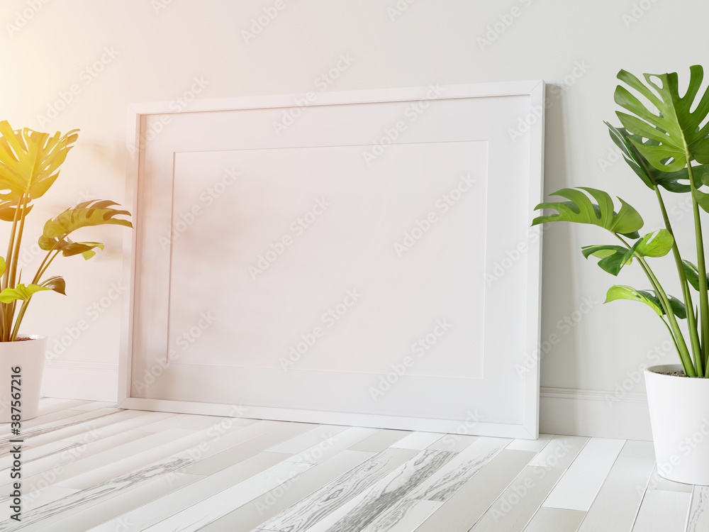 White frame leaning on floor in interior mockup. Template of a picture framed on a wall 3D rendering