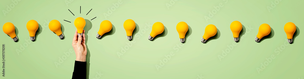 Many yellow light bulbs - Idea and creativity theme