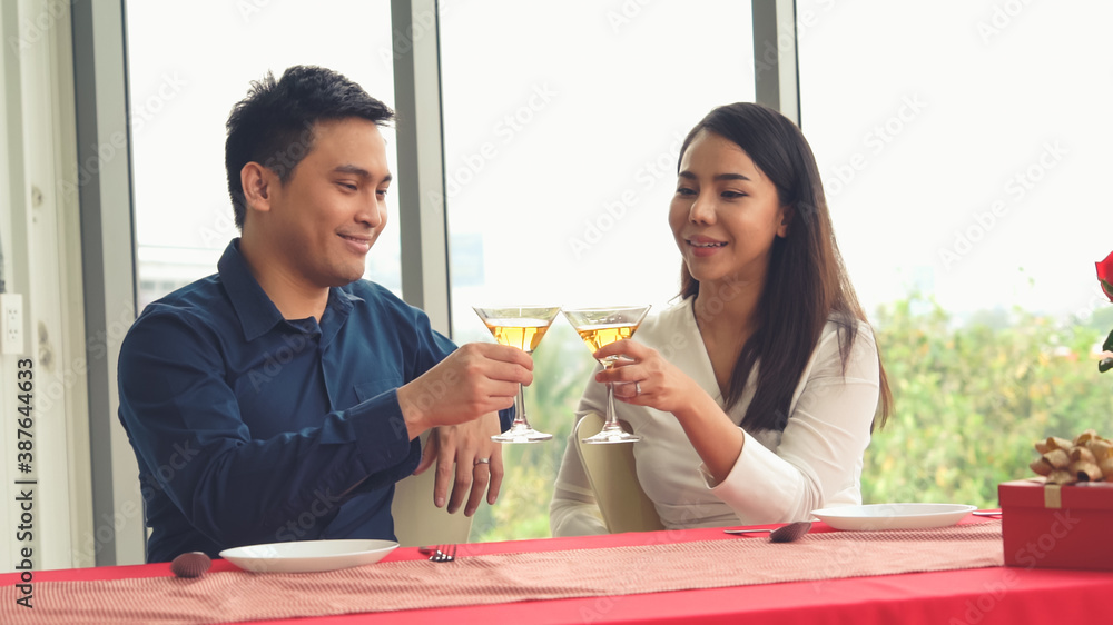 Happy romantic couple eating lunch at restaurant . Couple anniversary celebration and lifestyle .