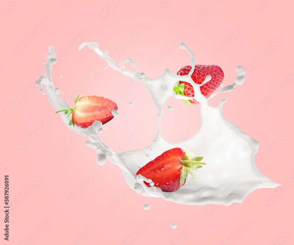 Splash of milk with ripe strawberry on color background