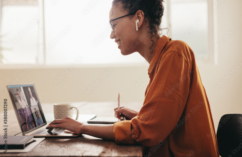 Business woman on a video conference call with colleagues