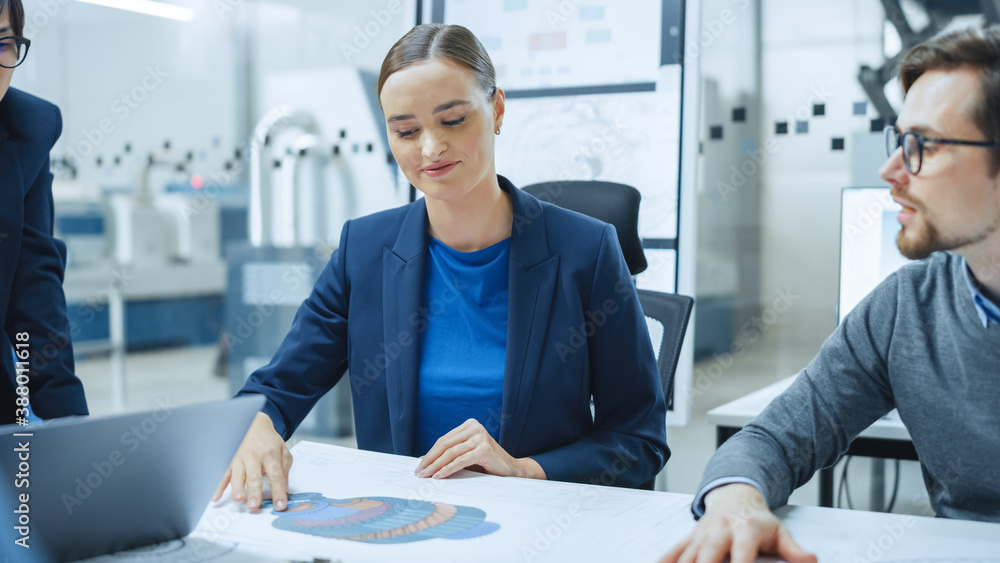 Modern Factory Office Meeting Room: Young Female Specialist Reports to Diverse Team of Engineers, Ma