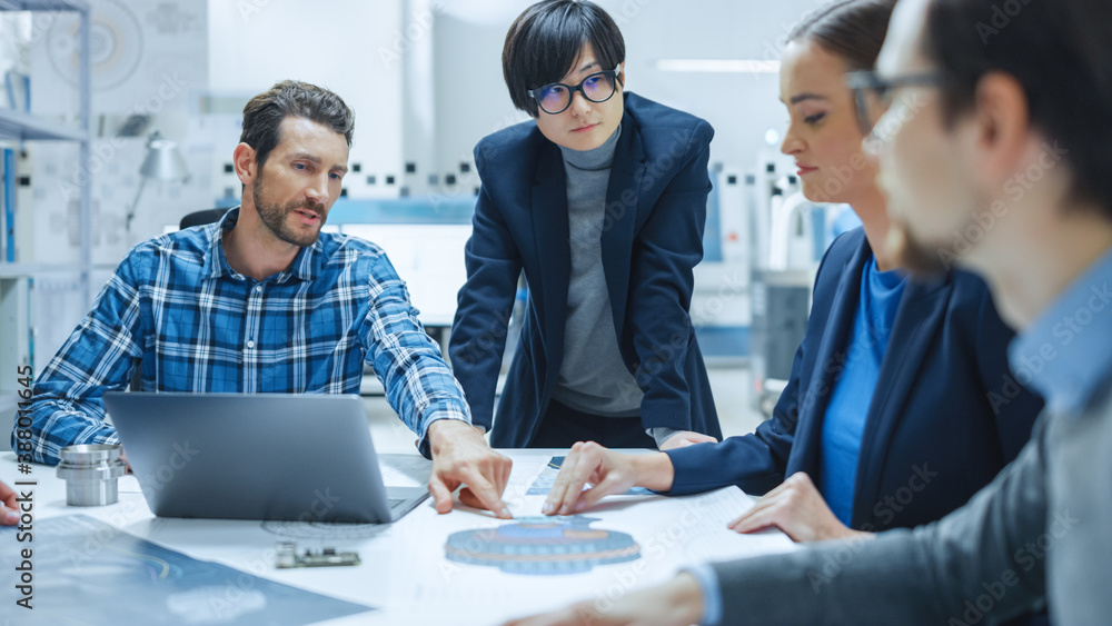 Modern Factory Office Meeting Room: Young Female Specialist Reports to Diverse Team of Engineers, Ma