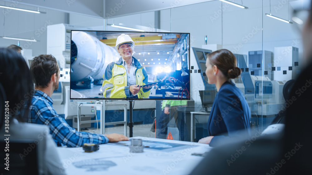 Diverse Group of Specialists, Managers in the Factory Office Meeting Room, Have Conference Video Cal