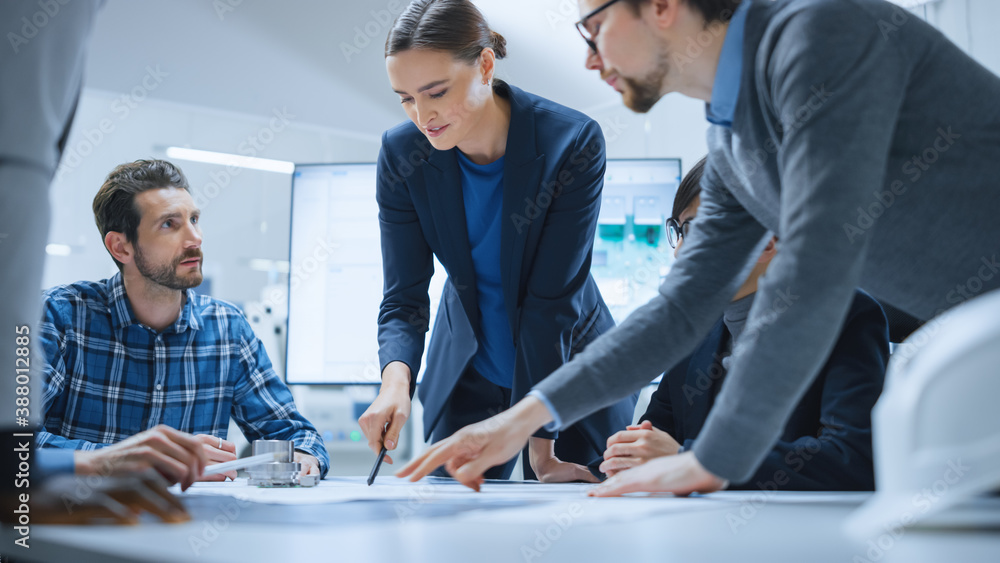 Busy Diverse Team of Computer Engineers and Specialists Gather Around Conference Table, They Discuss