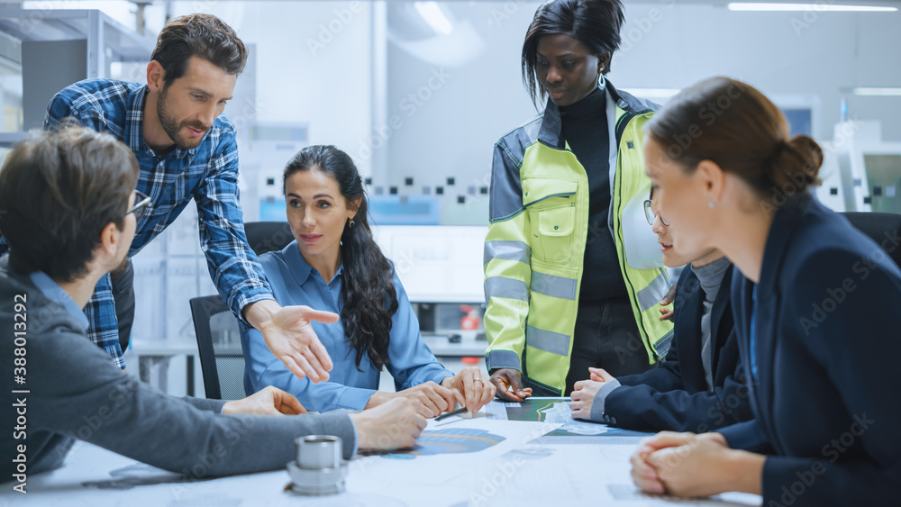 Busy Diverse Team of Computer Engineers, Specialists Gather Around Conference Table, They Discuss Pr