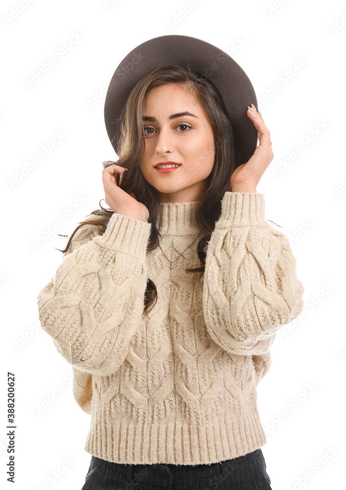 Stylish young woman in autumn clothes on white background