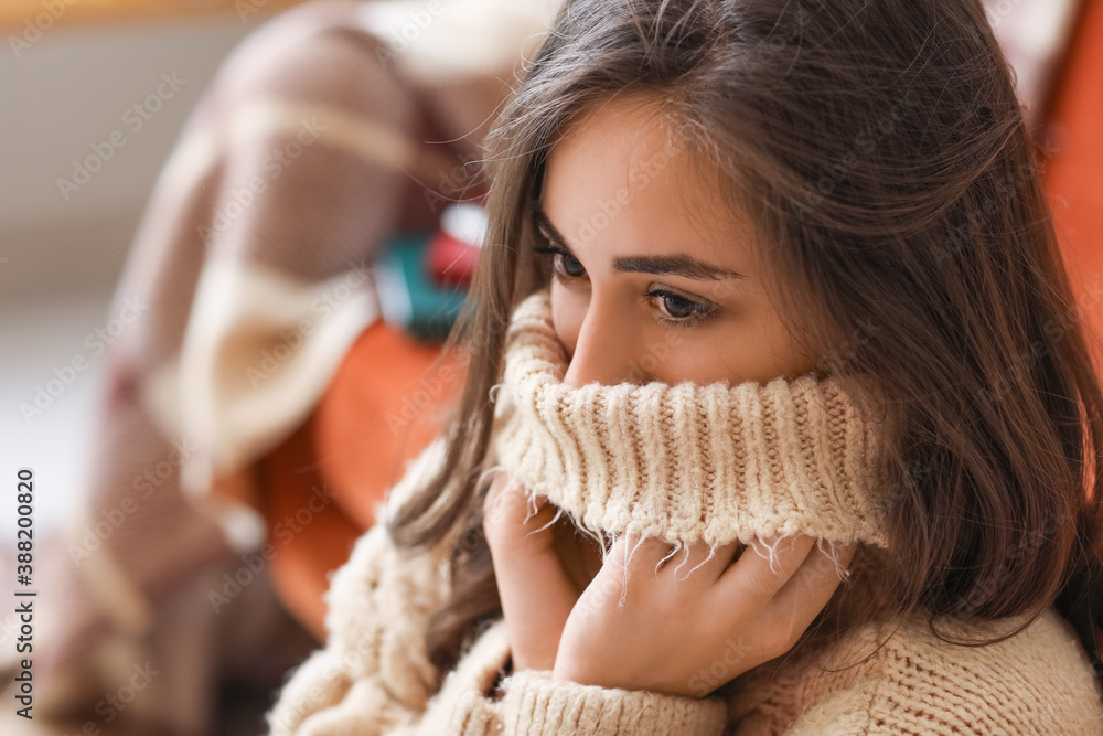 Beautiful young woman resting at home