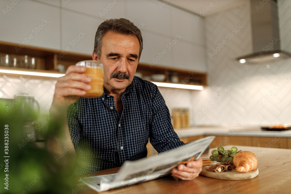 Drinking coffee, enjoying alone.