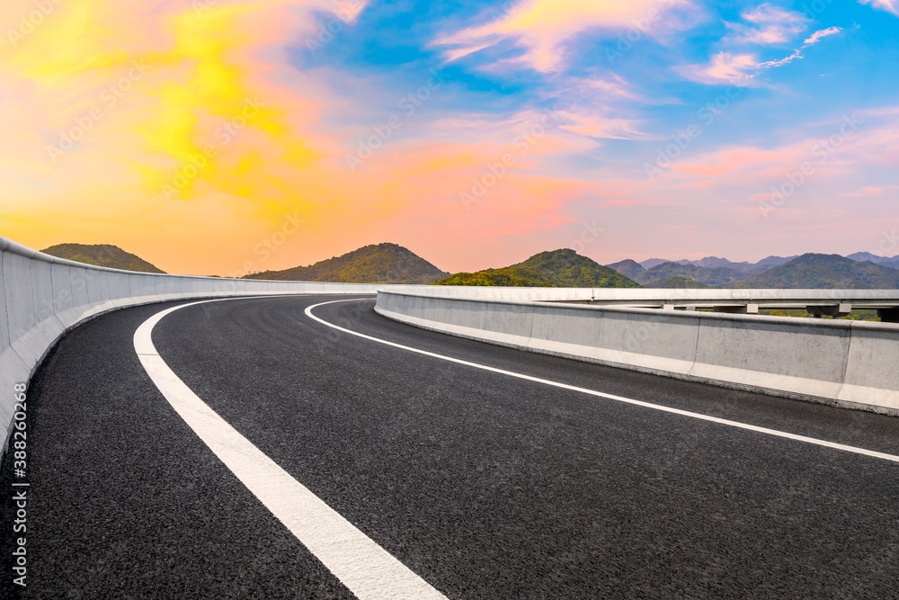 Asphalt viaduct road and beautiful sky cloud at sunrise.