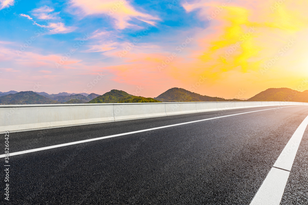 Asphalt viaduct road and beautiful sky cloud at sunrise.