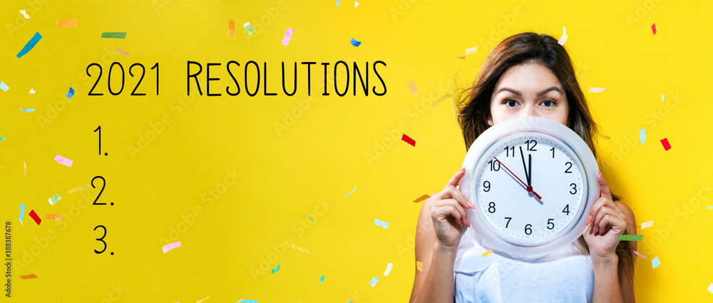 2021 Resolutions with young woman holding a clock showing nearly 12