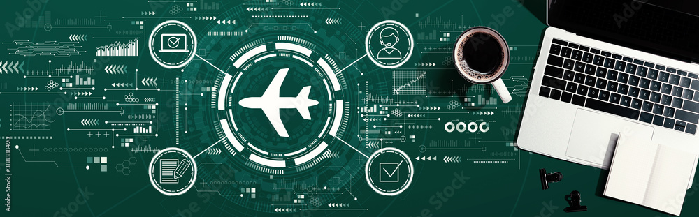 Flight ticket booking concept with a laptop computer on a desk