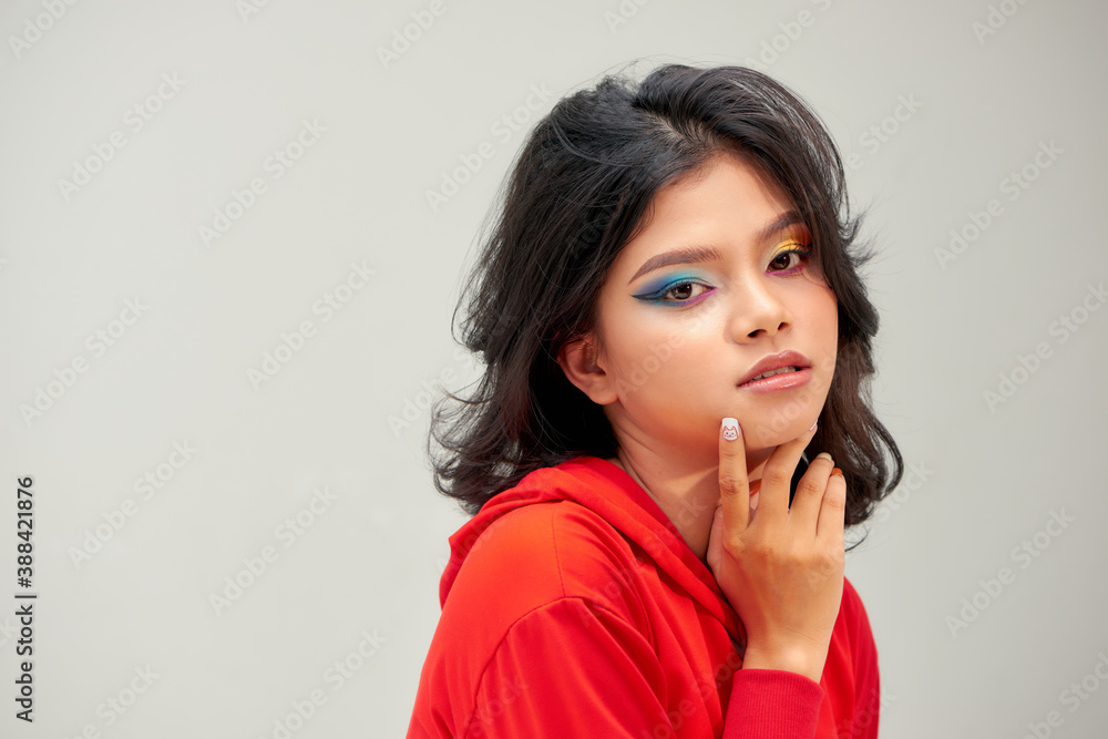 Beauty Girl Portrait with Colorful Makeup, Nail polish and ring Accessories. Colourful eyeshadows ma