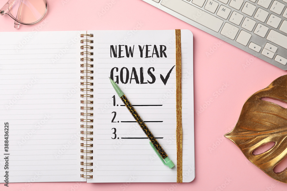 Notebook with empty to-do list for new year and pen on color background