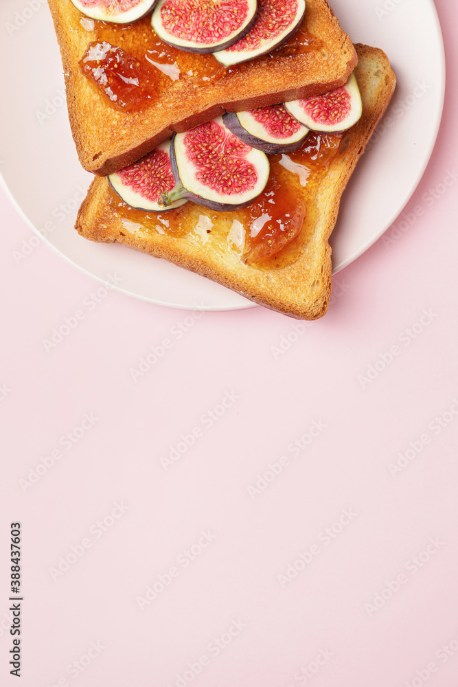 Tasty sandwiches with sweet fig jam on color background