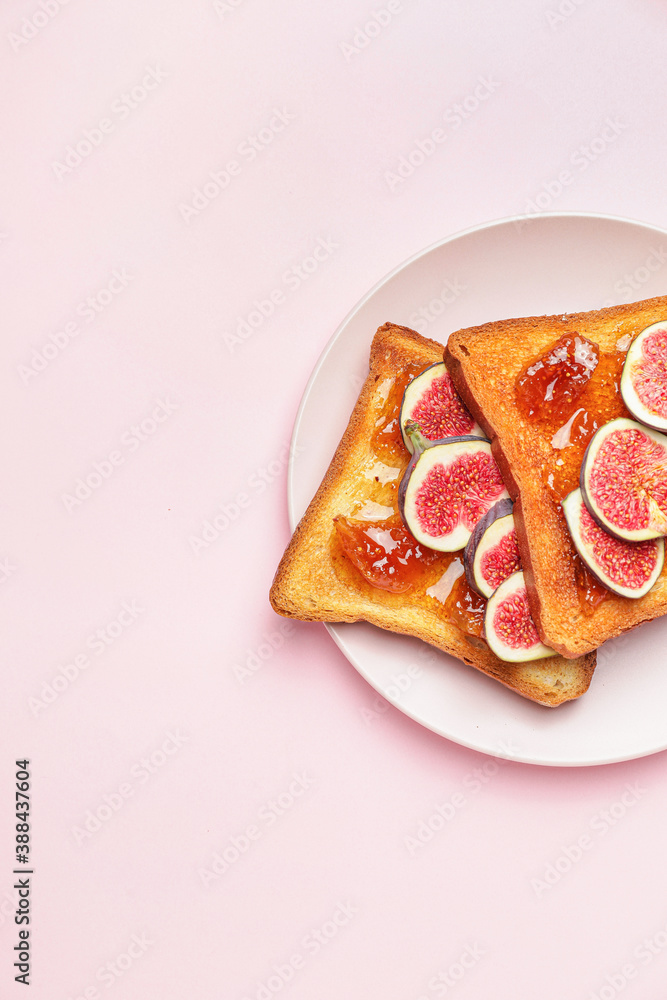 Tasty sandwiches with sweet fig jam on color background