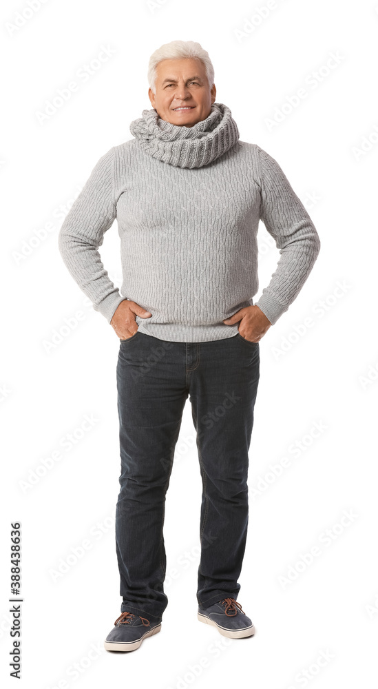 Mature man in winter clothes on white background