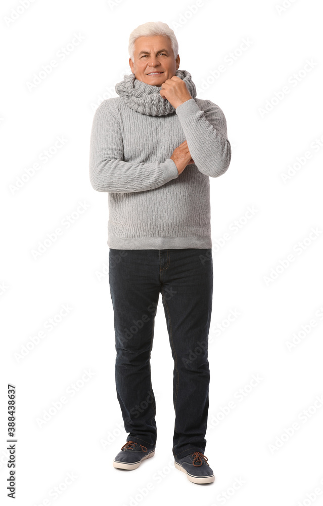 Mature man in winter clothes on white background