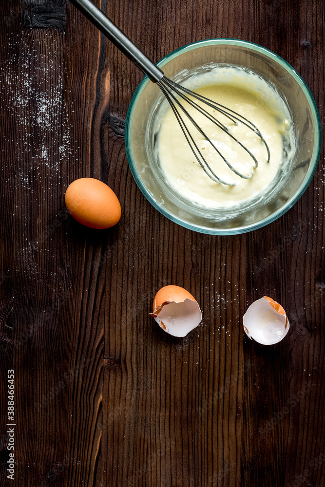 cooking pancake on wooden background top view ingredients for making