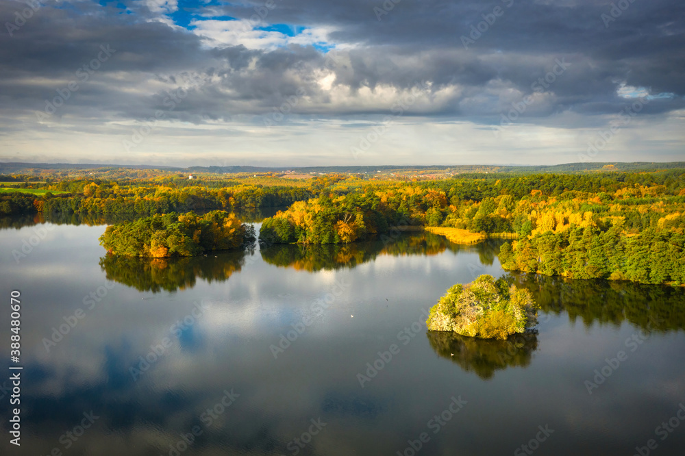 Golden autumn of Poland by the Straszyn lake from above.