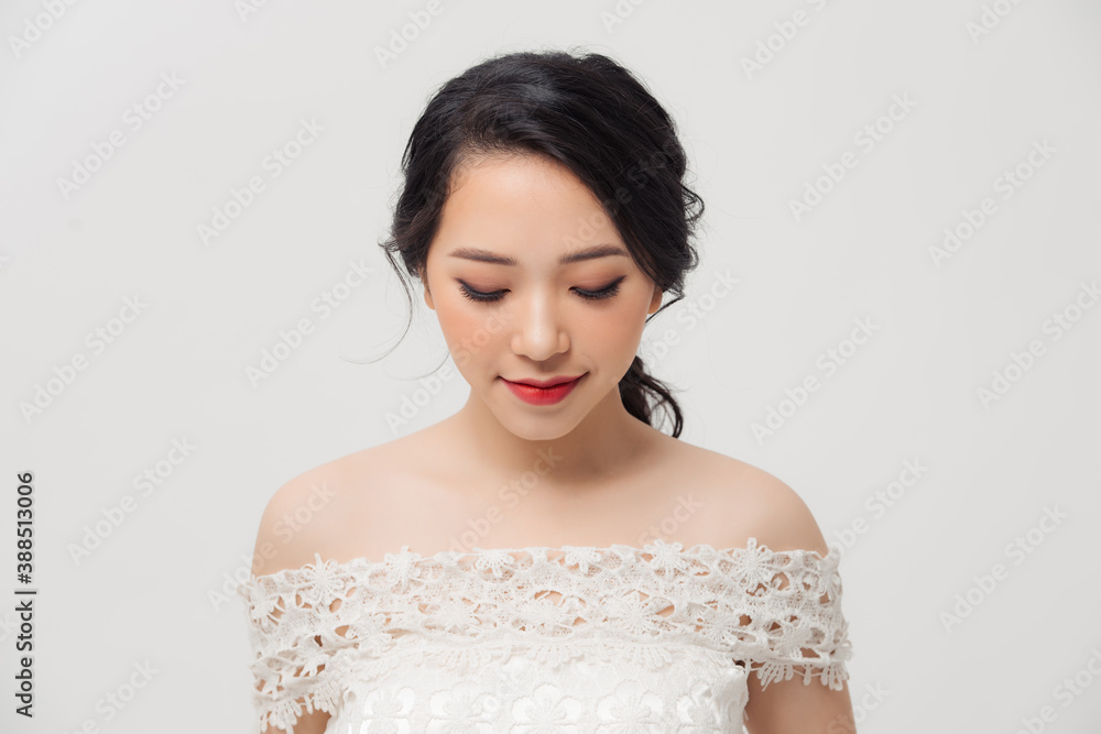 Fashionable photo of elegant Asian young girl with nice hairstyle