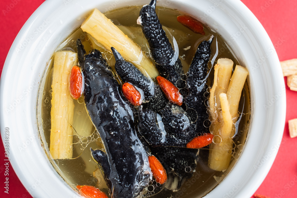 Stewed black chicken soup with codonopsis and wolfberry