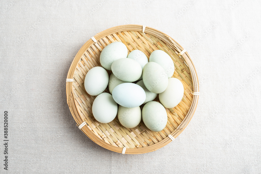 A plate of green-shelled ebony eggs